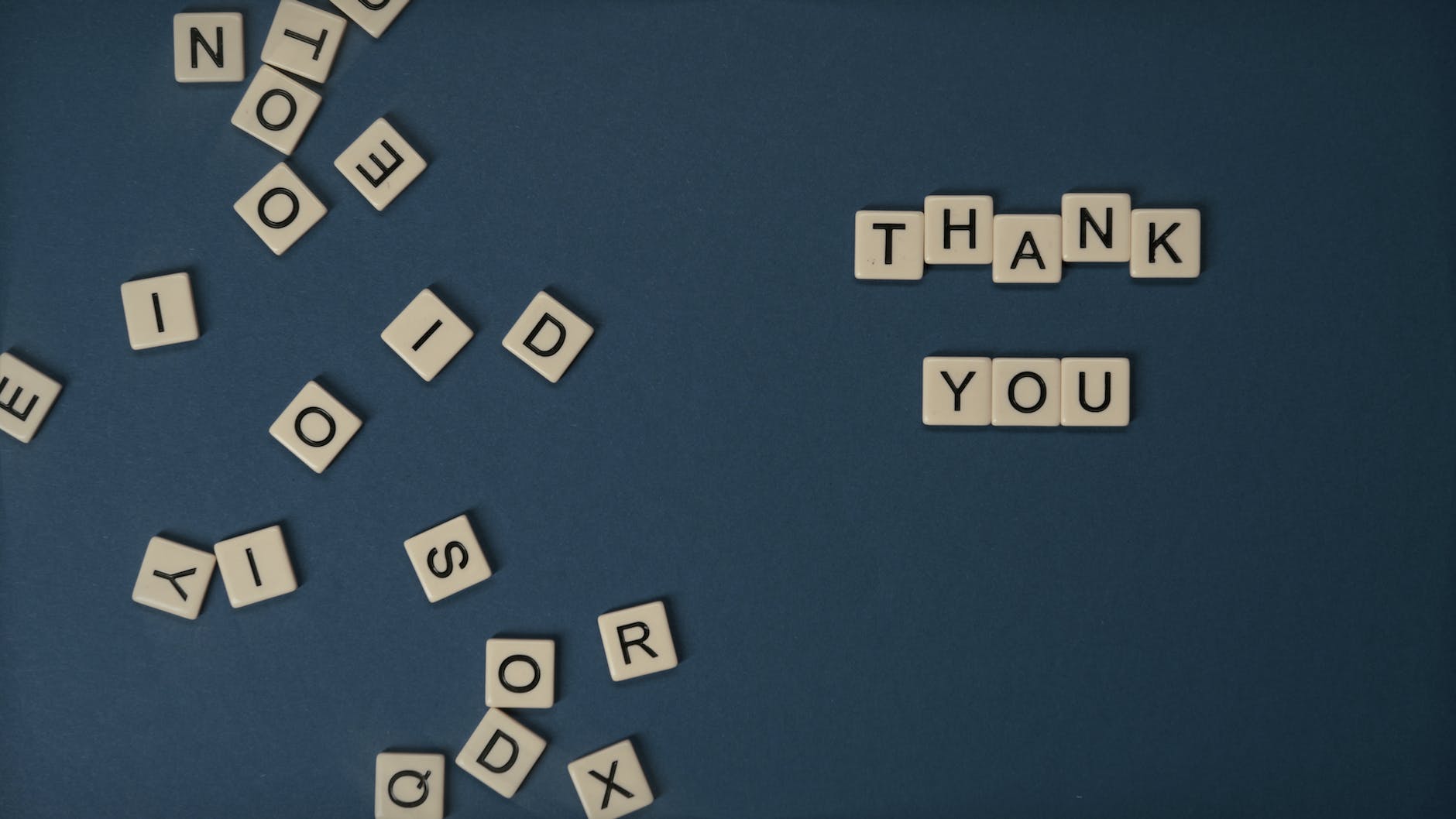 Scrabble tiles showing gratitude is something for mental wellness on the volleyball court and off